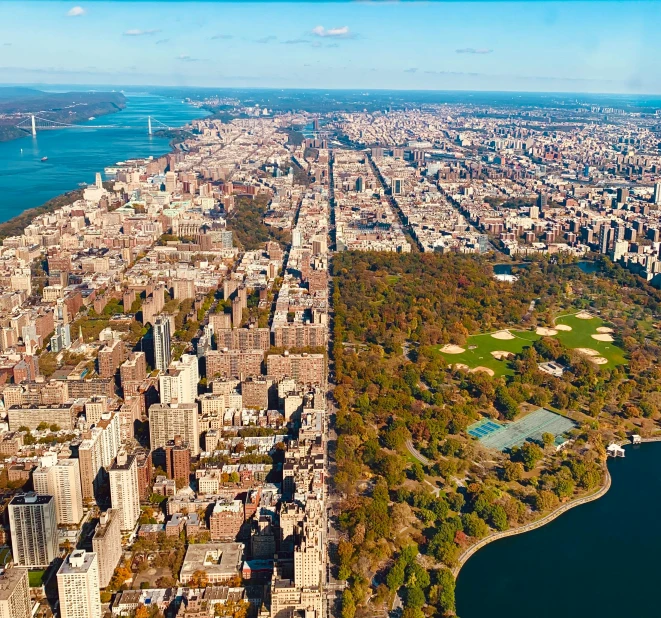 an aerial view of the city of new york, an album cover, pexels contest winner, hudson river school, parks and lakes, image split in half, 8 k hi - res, 8 k 1 0 8 0 p