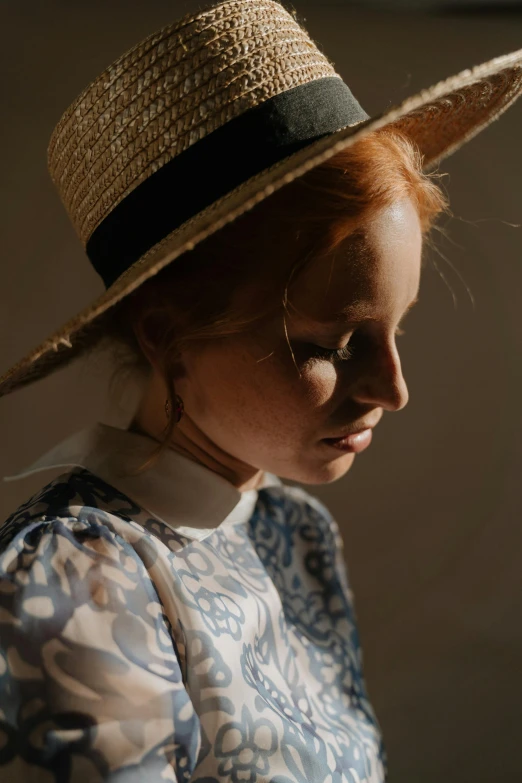 a close up of a person wearing a hat, a character portrait, by Anna Boch, unsplash, renaissance, little girl, ellie bamber, portrait casting long shadows, wearing 1 8 5 0 s clothes