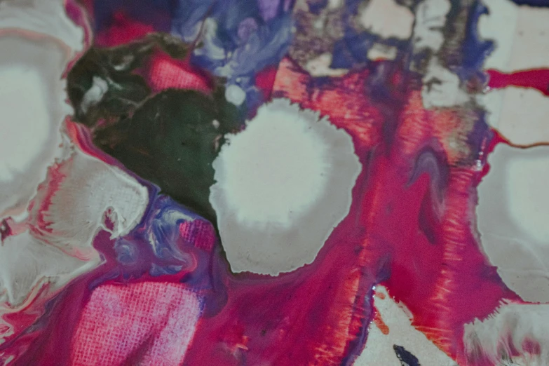 a close up of a painting on a table, inspired by Shōzō Shimamoto, lyrical abstraction, violet and pink palette, abstract album cover, silver dechroic details, flora-lush-crater