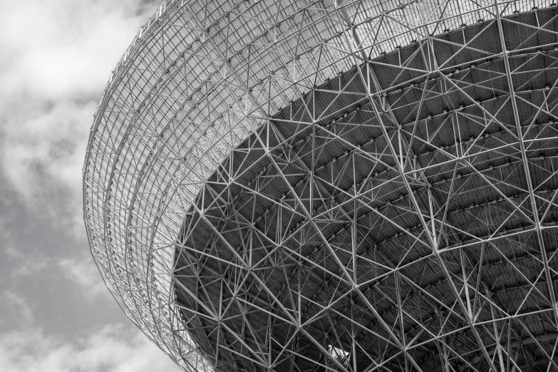 a black and white photo of a large building, inspired by Buckminster Fuller, unsplash contest winner, satellite dishes, fine detail post processing, hyperdetailed metalwork, spaceport