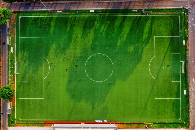an aerial view of a soccer field, by Paul Bird, pexels contest winner, ground angle uhd 8 k, concert, minimalist, actors
