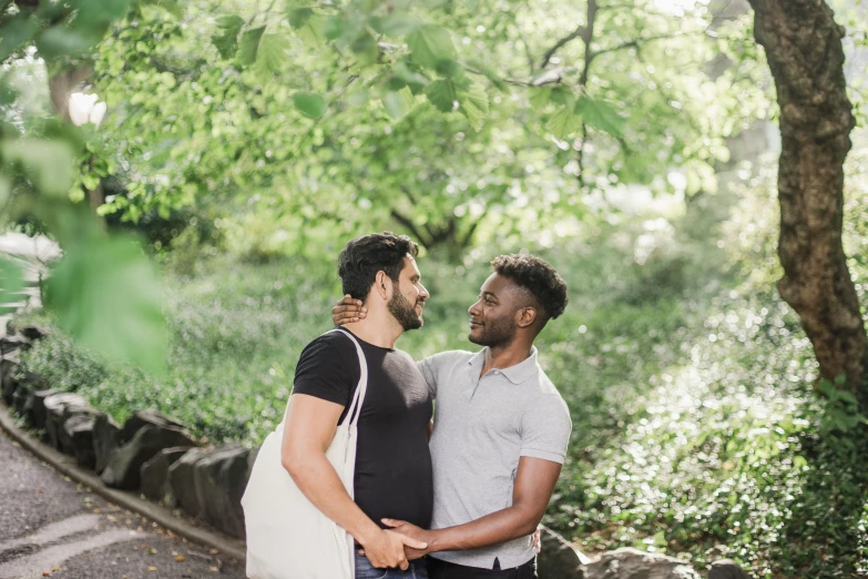 a couple of men standing next to each other, a photo, by Nina Hamnett, unsplash, central park, avatar image, lgbtq, attractive photo