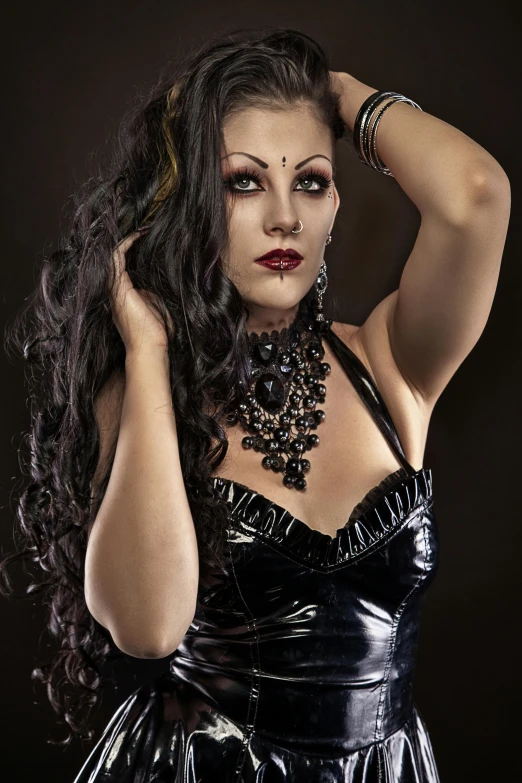 a woman in a black dress posing for a picture, inspired by Brom, latex flesh and facial muscles, dark hairs, profile image, black metal rococo