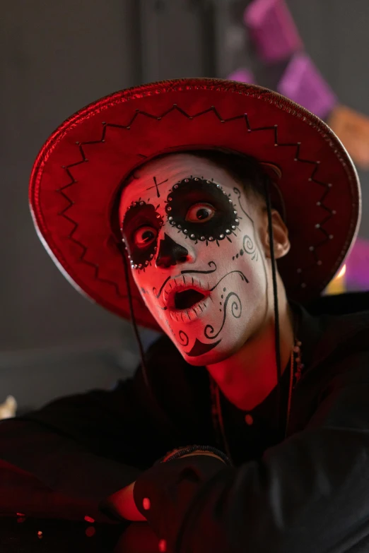 a close up of a person wearing a costume, lowbrow, el dia los muertos, he is wearing a hat, concert, avatar image