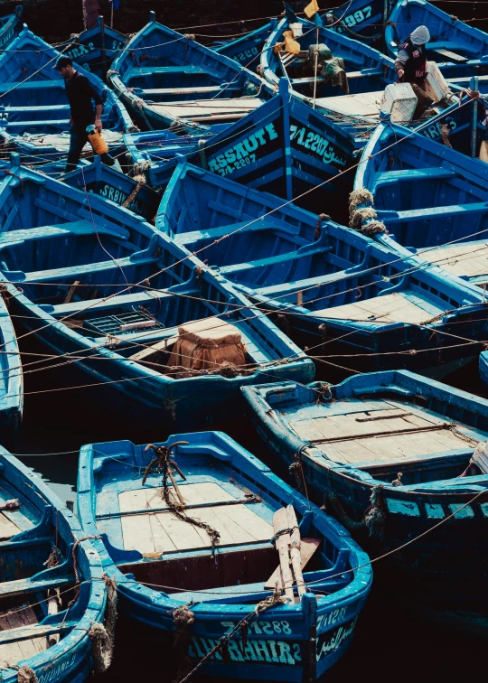 a group of blue boats sitting next to each other, pexels contest winner, process art, morocco, detailed color scan”, 4 k ”, graphic”