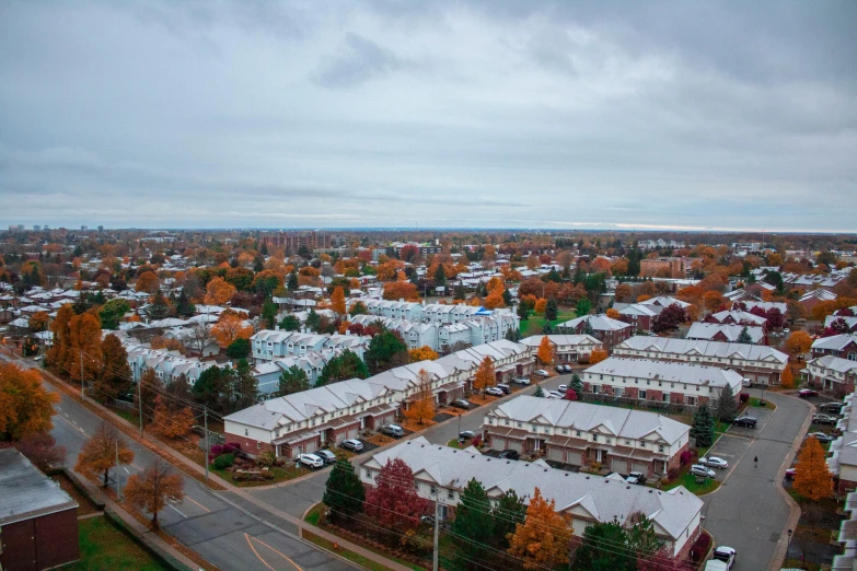an aerial view of a neighborhood in the fall, a portrait, unsplash, photorealism, white, wide angle shot 4 k hdr, 2 0 0 0's photo