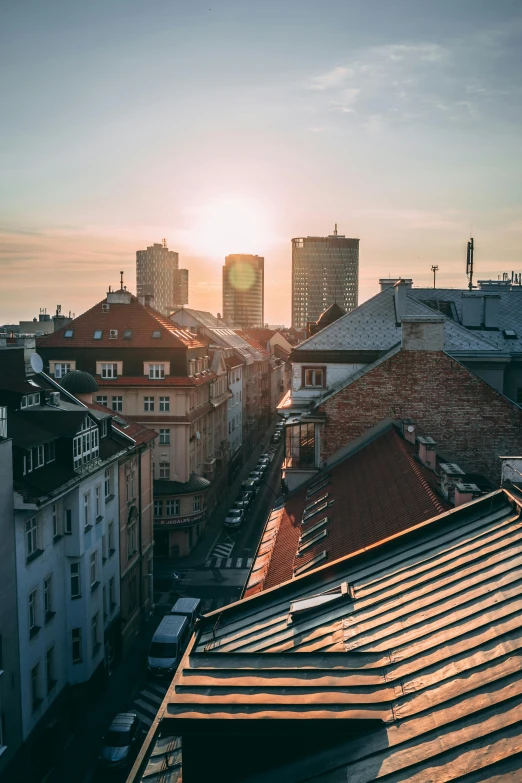 a view of a city from the top of a building, by Sebastian Spreng, golden hour 8k, orange roof, square, quaint