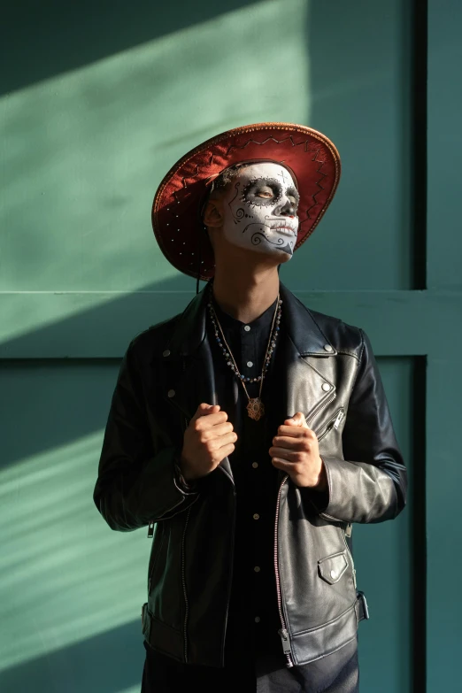 a man with a skeleton face painted on his face, an album cover, inspired by Byron Galvez, pexels contest winner, with hat, young spanish man, full body image, black man