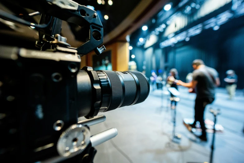 a close up of a camera on a tripod, shutterstock, video art, footage of a theater stage, instagram post, shot on sony a 7, music video