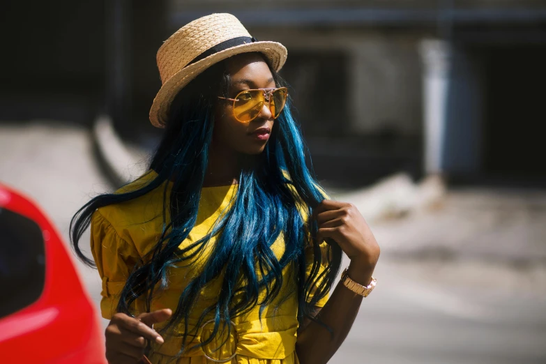 a woman with blue hair and a straw hat, trending on pexels, afrofuturism, shades of yellow, girl with long hair, street wear, nerdy black girl super hero