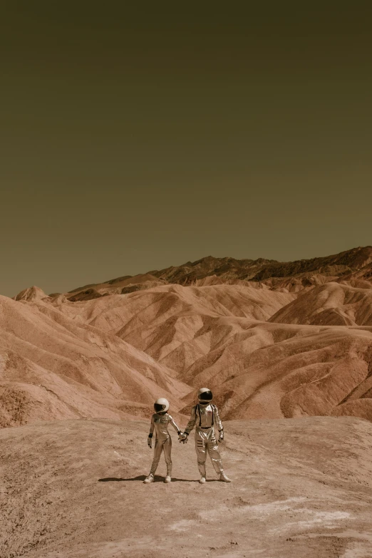 a couple of people standing on top of a dirt field, unsplash contest winner, surrealism, mars one mission, brown canyon background, holding hands, palm springs