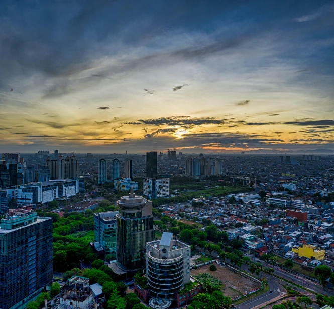 an aerial view of a city at sunset, by Erik Pevernagie, pexels contest winner, sumatraism, panorama view of the sky, slide show, square, high quality picture