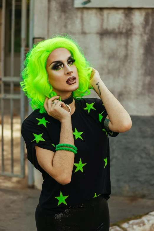 a woman with bright green hair posing for a picture, inspired by Elsa Bleda, trending on pexels, neon yellow stars, androgynous male, drag, square