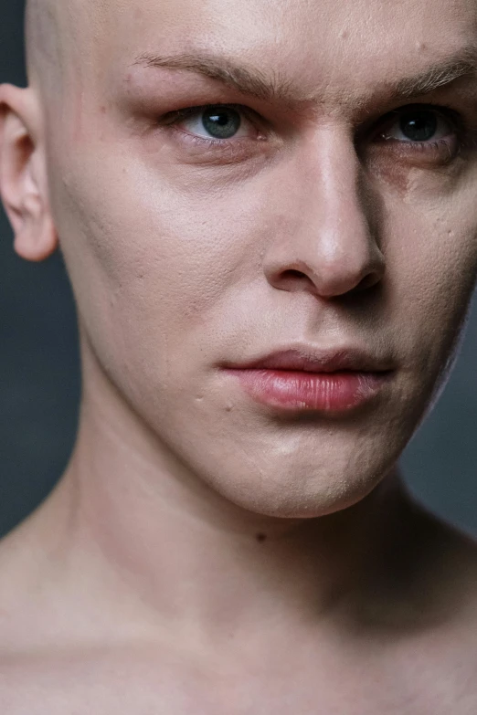 a close up of a person with a bald head, a character portrait, by Daarken, well-groomed model, young handsome pale roma, nonbinary model, anton fadeev 8 k