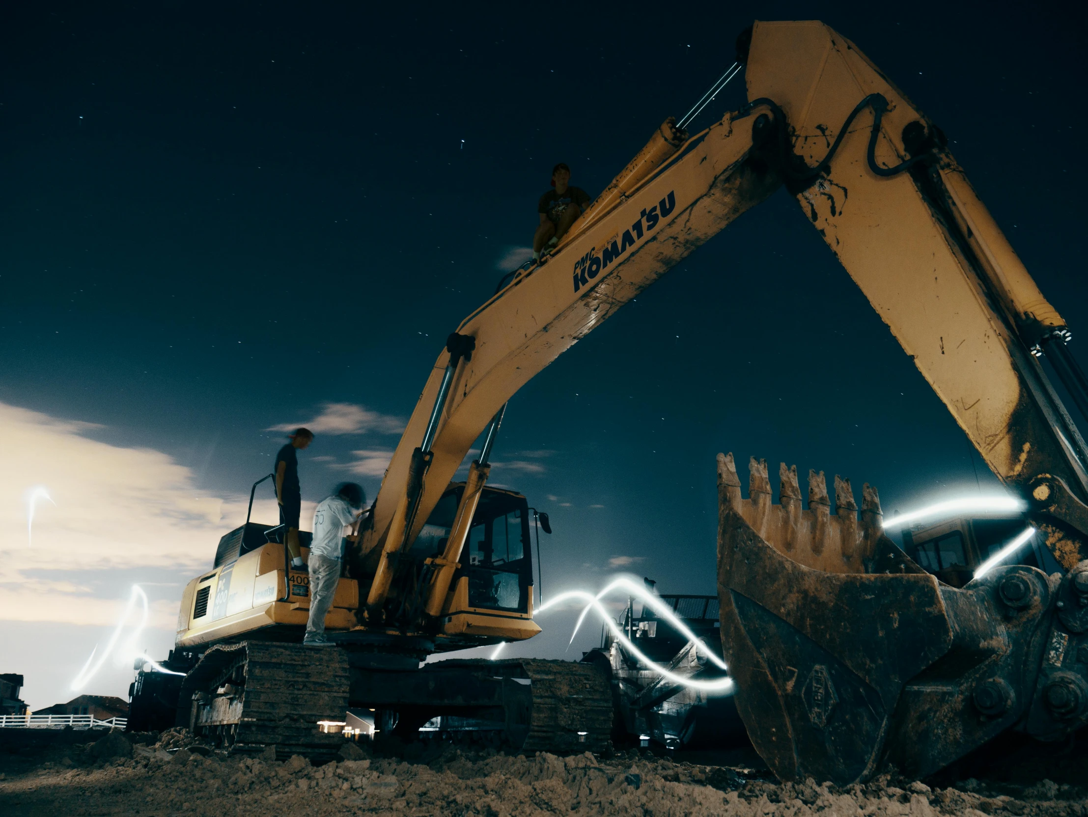 a large excavator sitting on top of a pile of dirt, by Adam Marczyński, pexels contest winner, fantastic realism, night time footage, cinematic outfit photo, ultrawide cinematic, profile pic