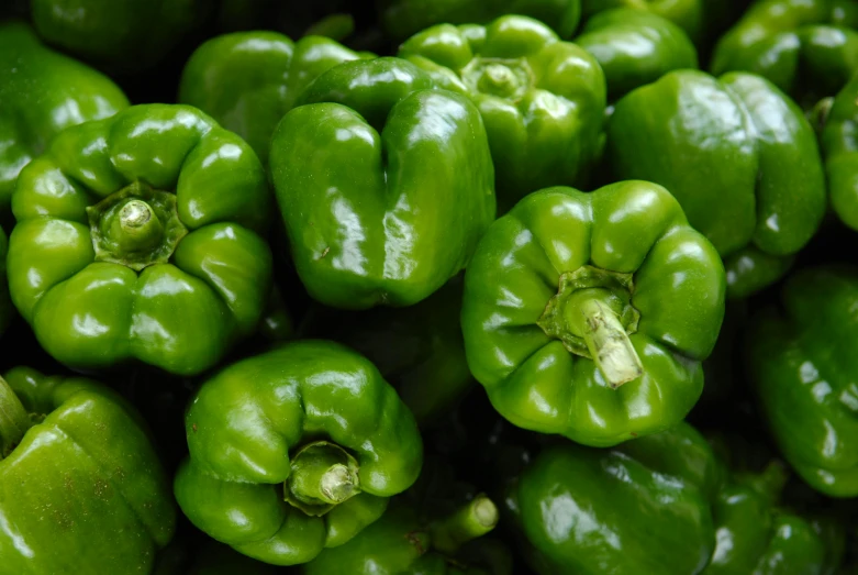 a pile of green peppers sitting on top of each other, pexels, renaissance, 🦩🪐🐞👩🏻🦳, close-up product photo, green flags, zoomed in