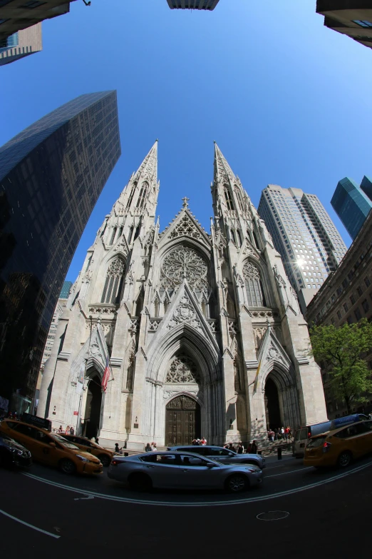 a large cathedral towering over a city street, manhattan, flying buttresses, immaculate shading, seen from outside