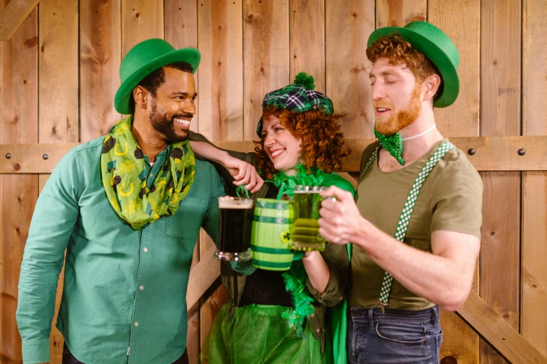 two men and a woman dressed up for st patrick's day, inspired by Mór Than, pexels, fan favorite, drink, lumberjack, deep green