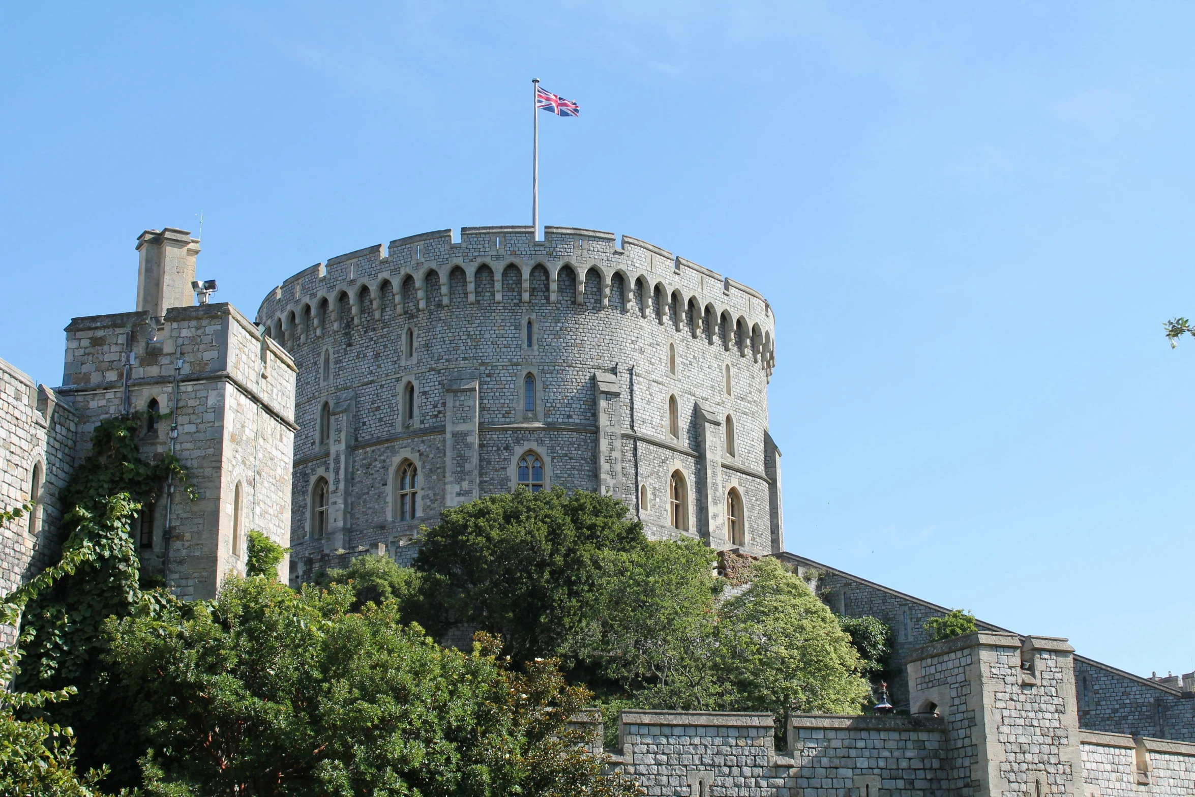 a castle with a flag on top of it, exterior, queen of england, fan favorite, buttresses