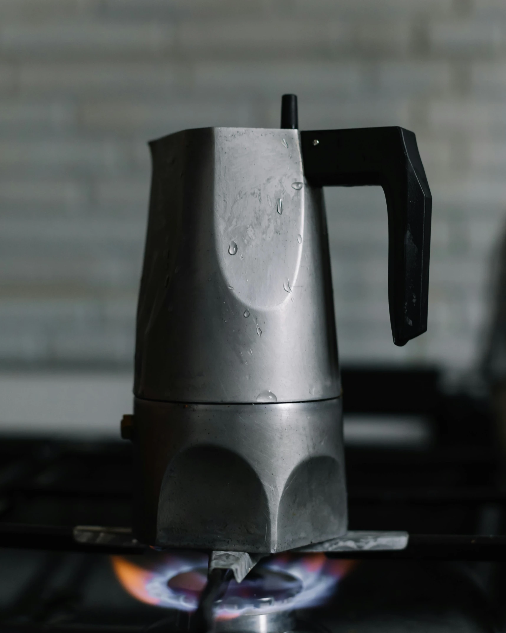 a stove top with a pot on top of it, grey alien, coffee machine, thumbnail, no cropping