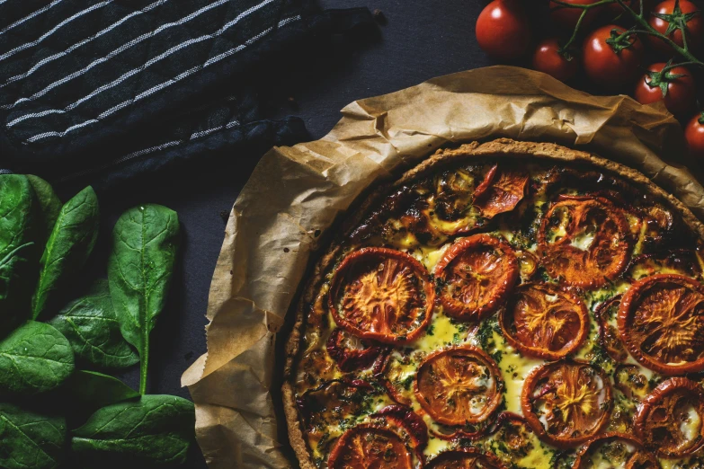 a pizza sitting on top of a wooden cutting board, by Emma Andijewska, pexels contest winner, renaissance, greens), dark-skinned, also one tomato slice, thumbnail