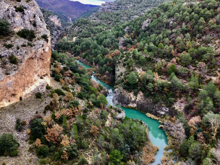 a river running through a lush green valley, les nabis, ocher and turquoise colors, estefania villegas burgos, instagram photo, costa blanca