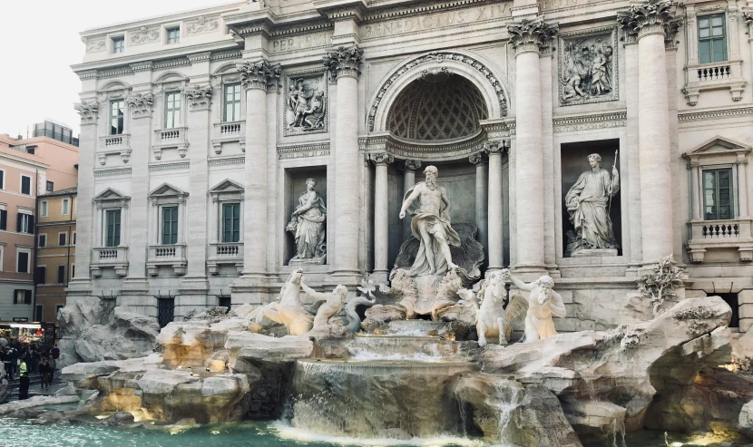 a large building with a fountain in front of it, a marble sculpture, by Tom Wänerstrand, pexels contest winner, neoclassicism, multiple waterfalls, 🦩🪐🐞👩🏻🦳, pasta, grey