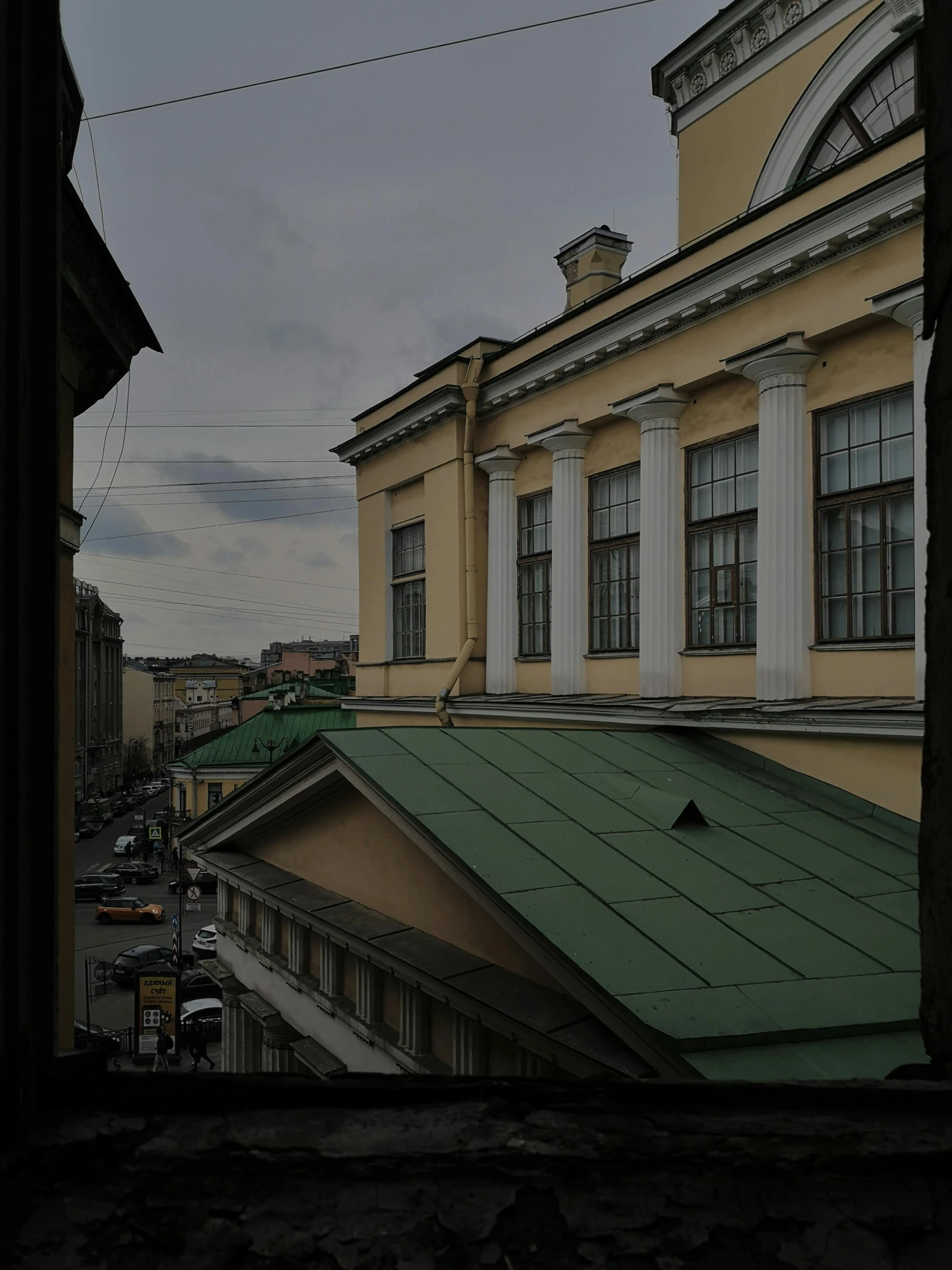 a view of a city from a window, an album cover, inspired by Vasily Surikov, pexels contest winner, neoclassicism, grey, square, museum photo, color picture