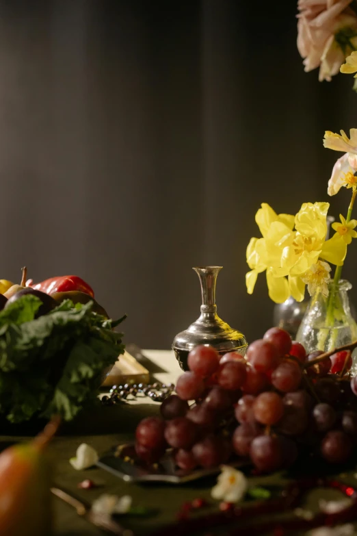 a bunch of fruit and vegetables on a table, inspired by Caravaggio, renaissance, silver and yellow color scheme, medium shot angle, edible flowers, wine