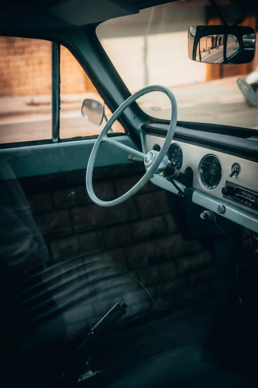 a close up of a car dashboard with a steering wheel, a portrait, by Sven Erixson, unsplash, modernism, square, soviet interior, white, 15081959 21121991 01012000 4k
