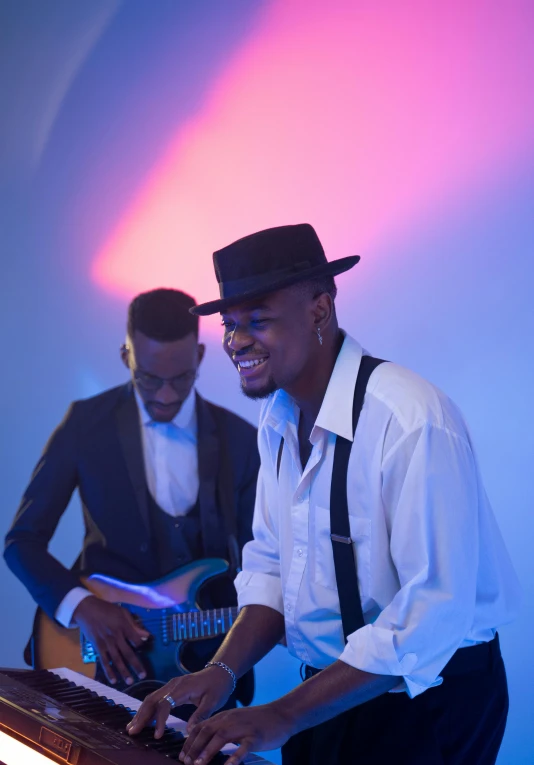 a couple of men standing next to each other in front of a keyboard, an album cover, by Chinwe Chukwuogo-Roy, pexels, happening, top hats, lights, 15081959 21121991 01012000 4k, instagram photo