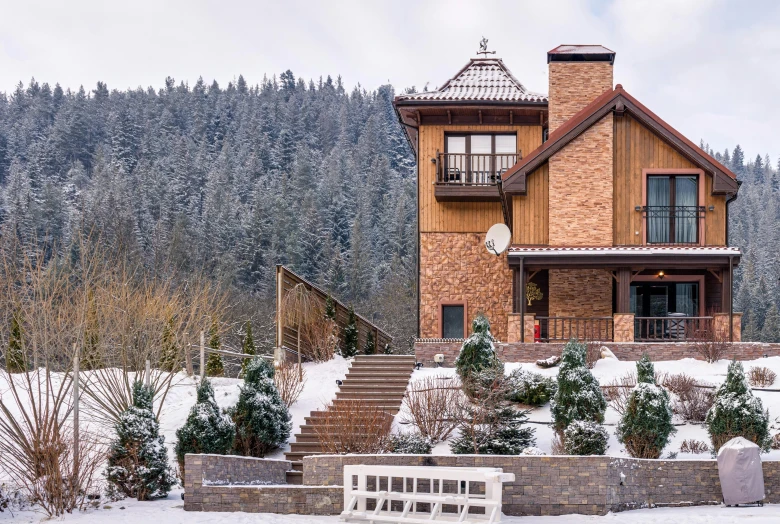 a house sitting on top of a snow covered hillside, inspired by Edward Willis Redfield, pexels contest winner, art nouveau, exterior view, фото девушка курит, modern rustic, pine