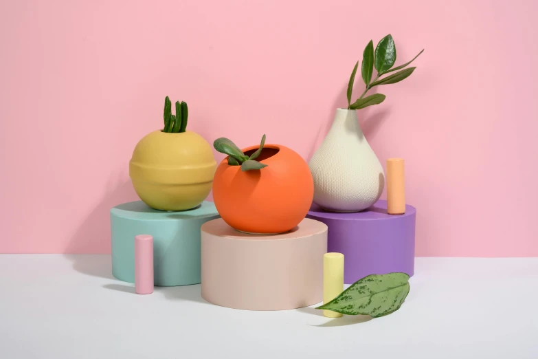 a couple of vases sitting on top of a table, a still life, inspired by Jeff Koons, trending on unsplash, plasticien, orange pastel colors, with fruit trees, pastel matte colors, round form