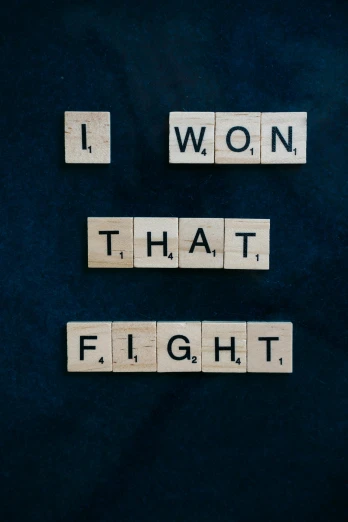 scrabbles spelling i won that flight, an album cover, pexels contest winner, fighting aggression, inspire and overcome, ultimate fighting championship, ( ( emma lindstrom ) )
