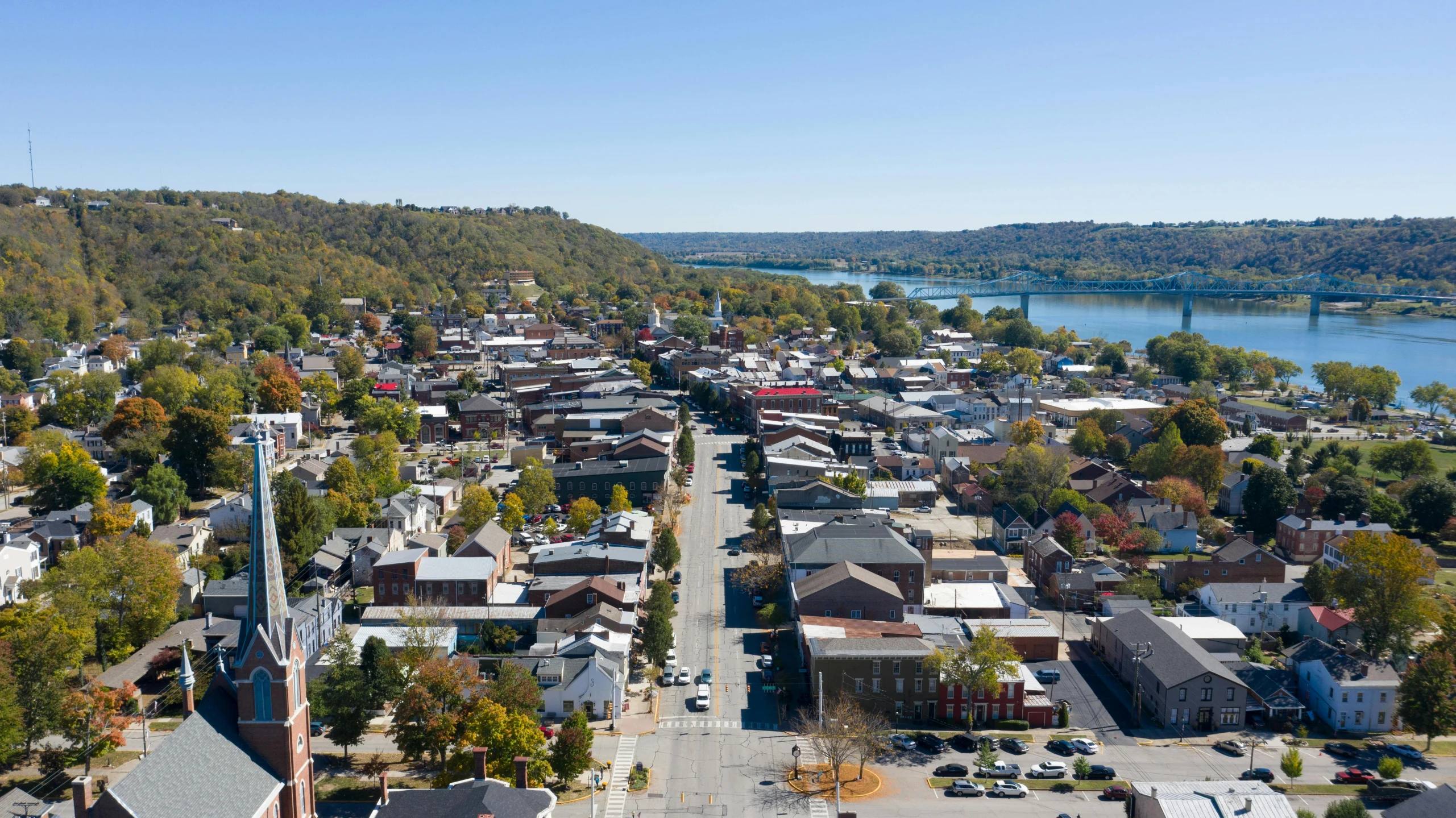 an aerial view of a town with a river in the background, by Dan Frazier, square, washington main street, high res 8k, vivid)