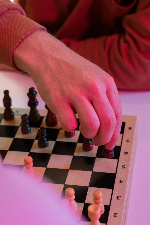 a close up of a person playing a game of chess, pink power, technologies, thumbnail