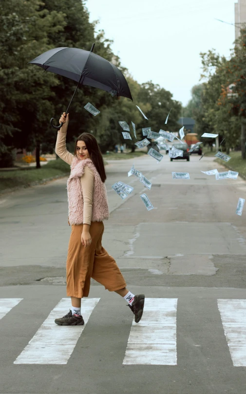 a woman crossing a street while holding an umbrella, throwing cards in the air, 15081959 21121991 01012000 4k, fullbody photo, fashion shoot 8k