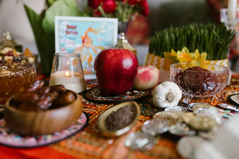 a table that has a bunch of food on it, pexels, qajar art, close up shot of an amulet, backdrop, background image, thumbnail