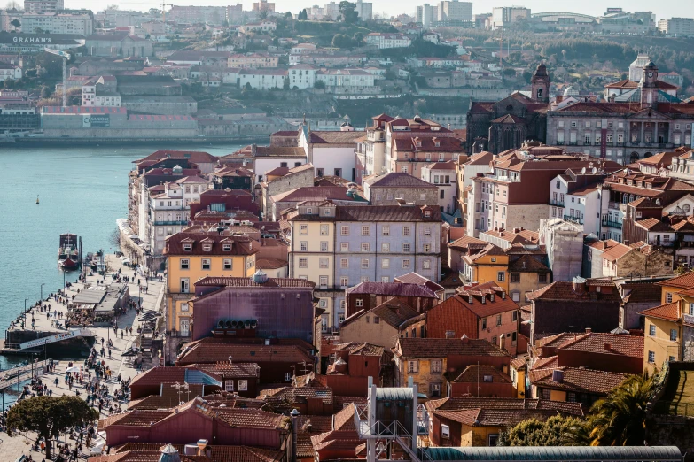 a view of a city from the top of a hill, inspired by Almada Negreiros, pexels contest winner, renaissance, square, julia hetta, brown, full frame image