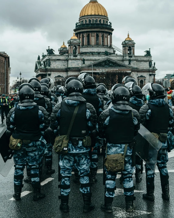 a group of police standing in front of a building, trending on unsplash, socialist realism, saint petersburg, full of greenish liquid, dome, gay rights