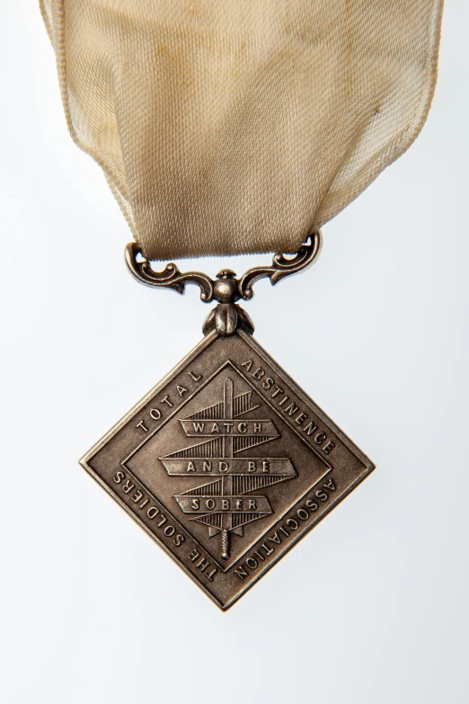 a close up of a medal on a white background, an engraving, by Ruth Abrahams, todd macfarlane, high school badge, side front view, high view