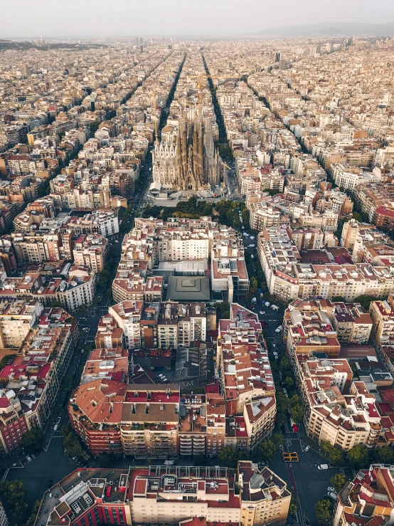 a large city filled with lots of tall buildings, a picture, by Gaudi, unsplash contest winner, 8k uhd”, square, aerial, historical