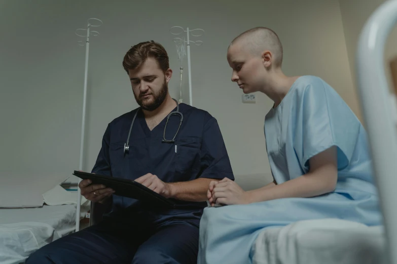 a couple of men sitting next to each other on a bed, pexels contest winner, medical research facility, bald patch, inspect in inventory image, nurse