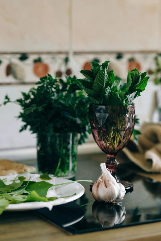 a close up of a plate of food on a table, renaissance, plants in glass vase, hero shot, basil, harvest