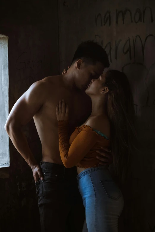 a man and a woman kissing in front of a window, inspired by Elsa Bleda, pexels contest winner, beefcake pose, in a warehouse, instagram model, 👰 🏇 ❌ 🍃