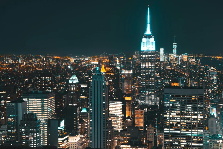 a view of a city at night from the top of a building, new york backdrop, instagram post, high-resolution, cities