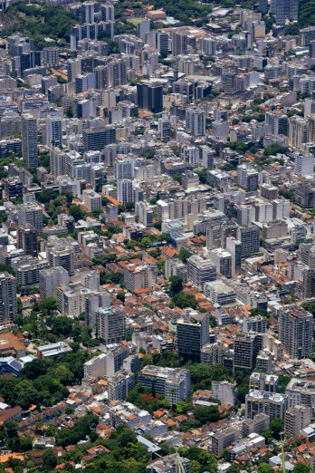 an aerial view of a city with lots of tall buildings, by Fernando Gerassi, square, high-resolution photo, edu souza, small