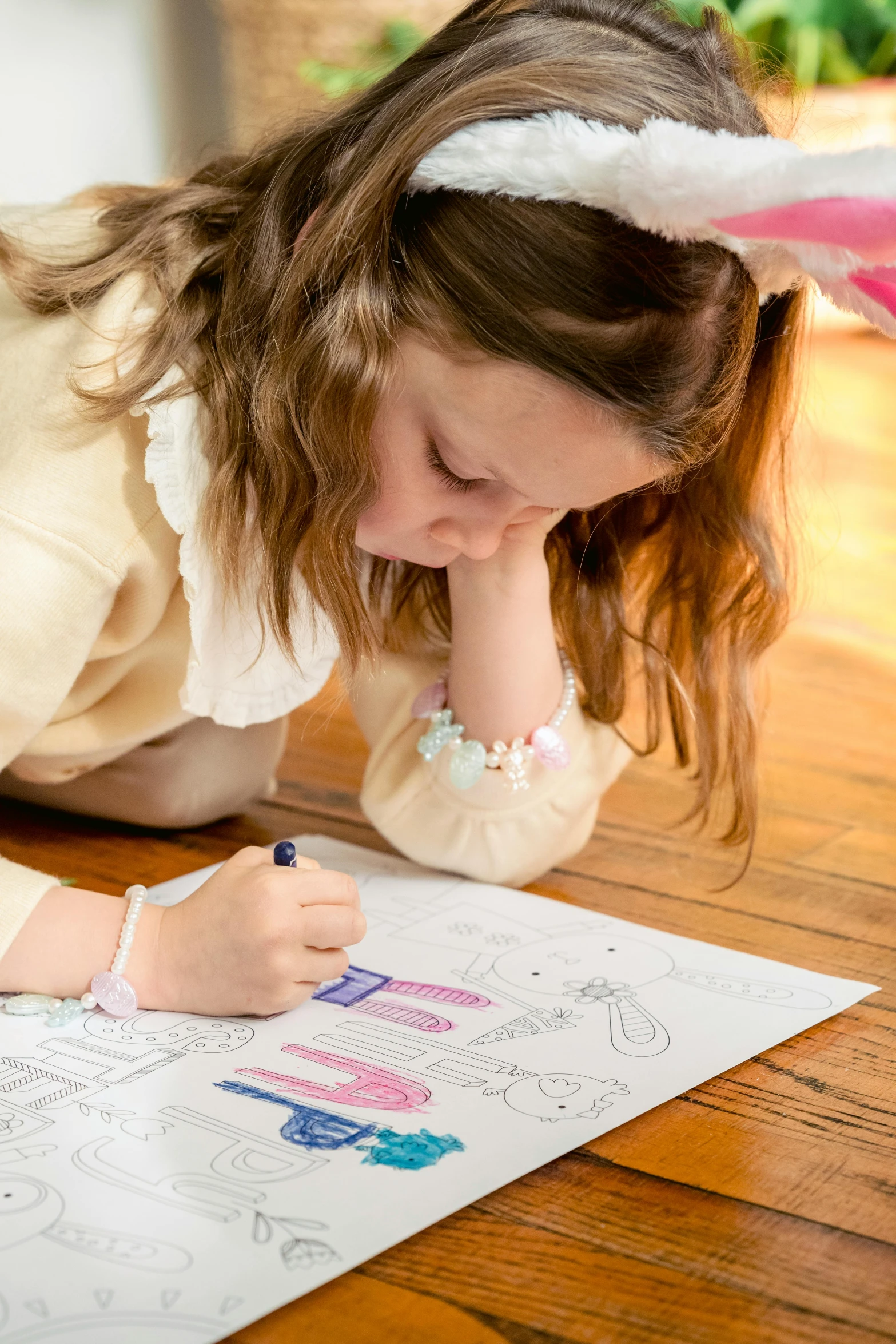 a little girl that is laying down on the floor, a child's drawing, pexels contest winner, coloring book page, full product shot, girl wearing uniform, technical drawings