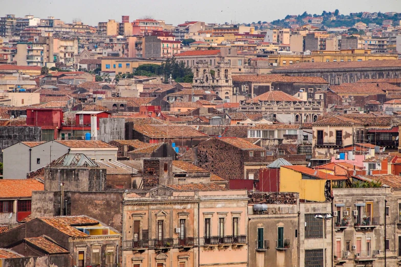 a city filled with lots of tall buildings, renaissance, sicilian, brown, fan favorite, brightly colored buildings