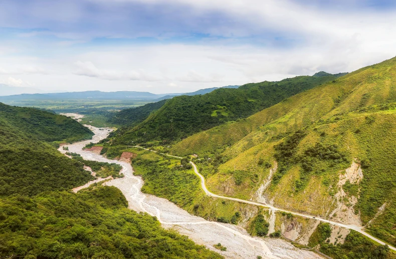 a river flowing through a lush green valley, by Daniel Lieske, pexels contest winner, sumatraism, mexico, landslide road, panorama view, profile image